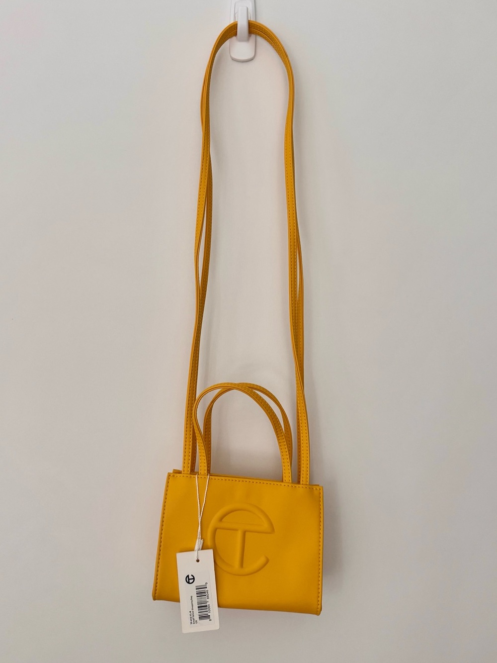 Telfar Small Crossbody shopping Bag with Embossed Logo, yellow